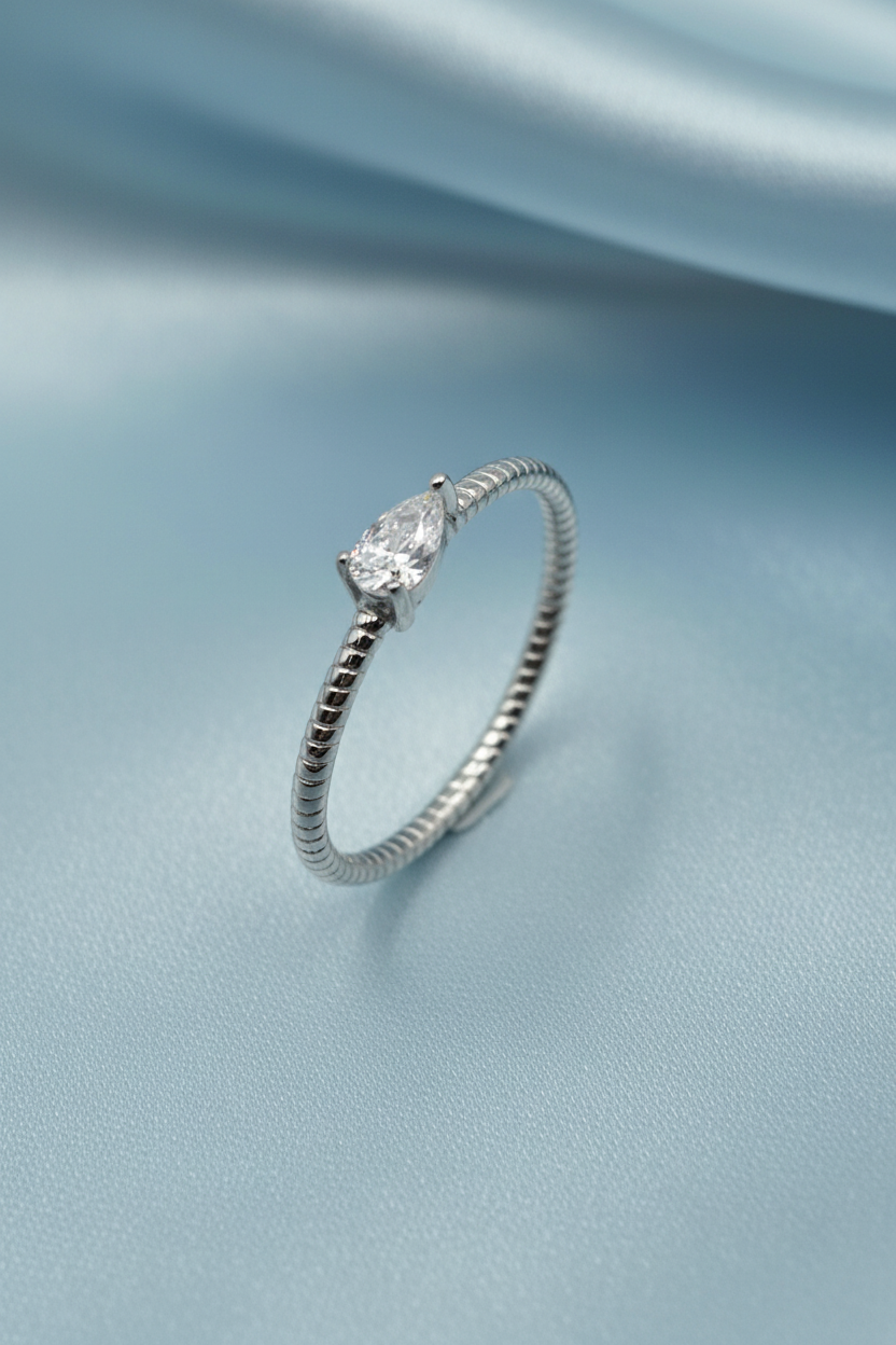 Pear Solitaire Ring