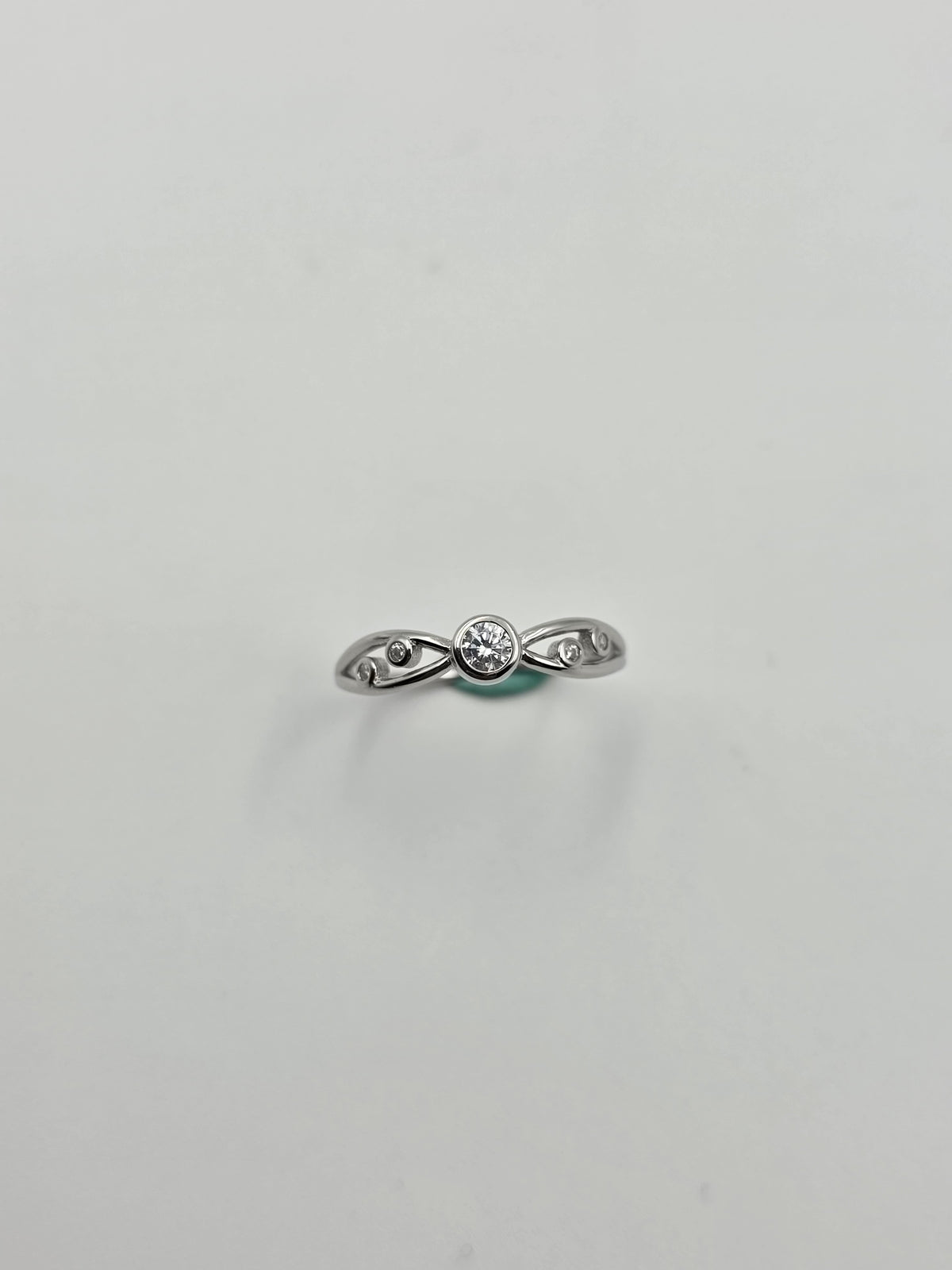 Infinity Solitaire Bezel Ring