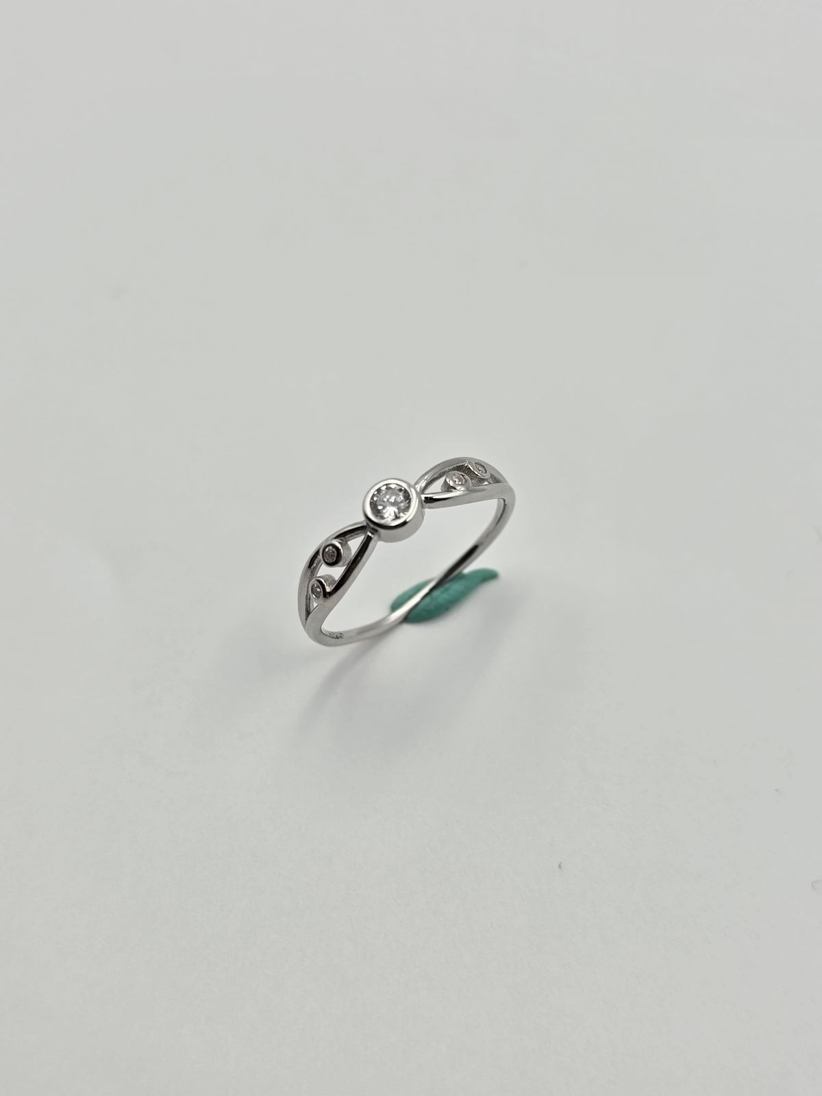 Infinity Solitaire Bezel Ring