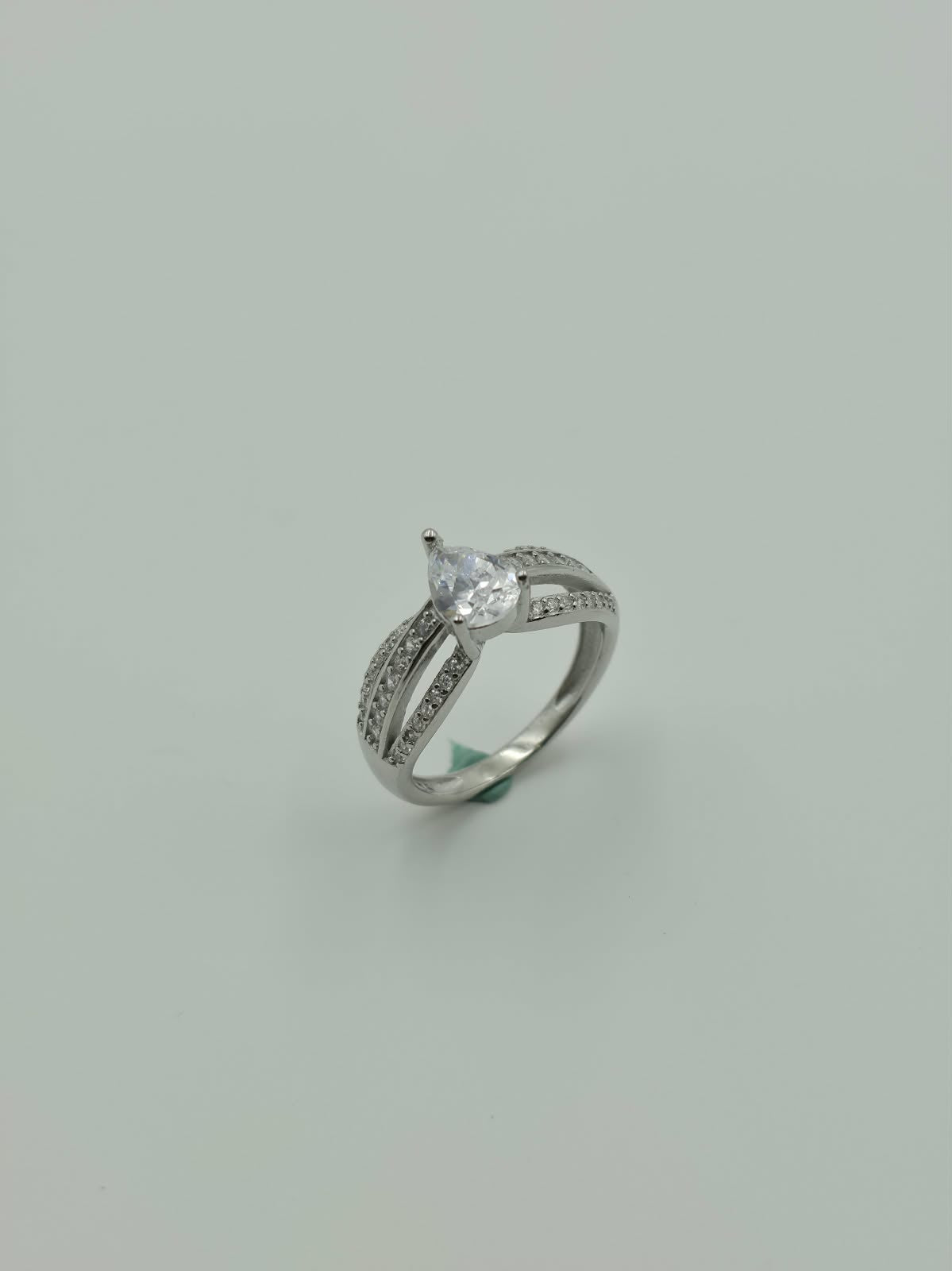 Lumière Pear Solitaire Ring