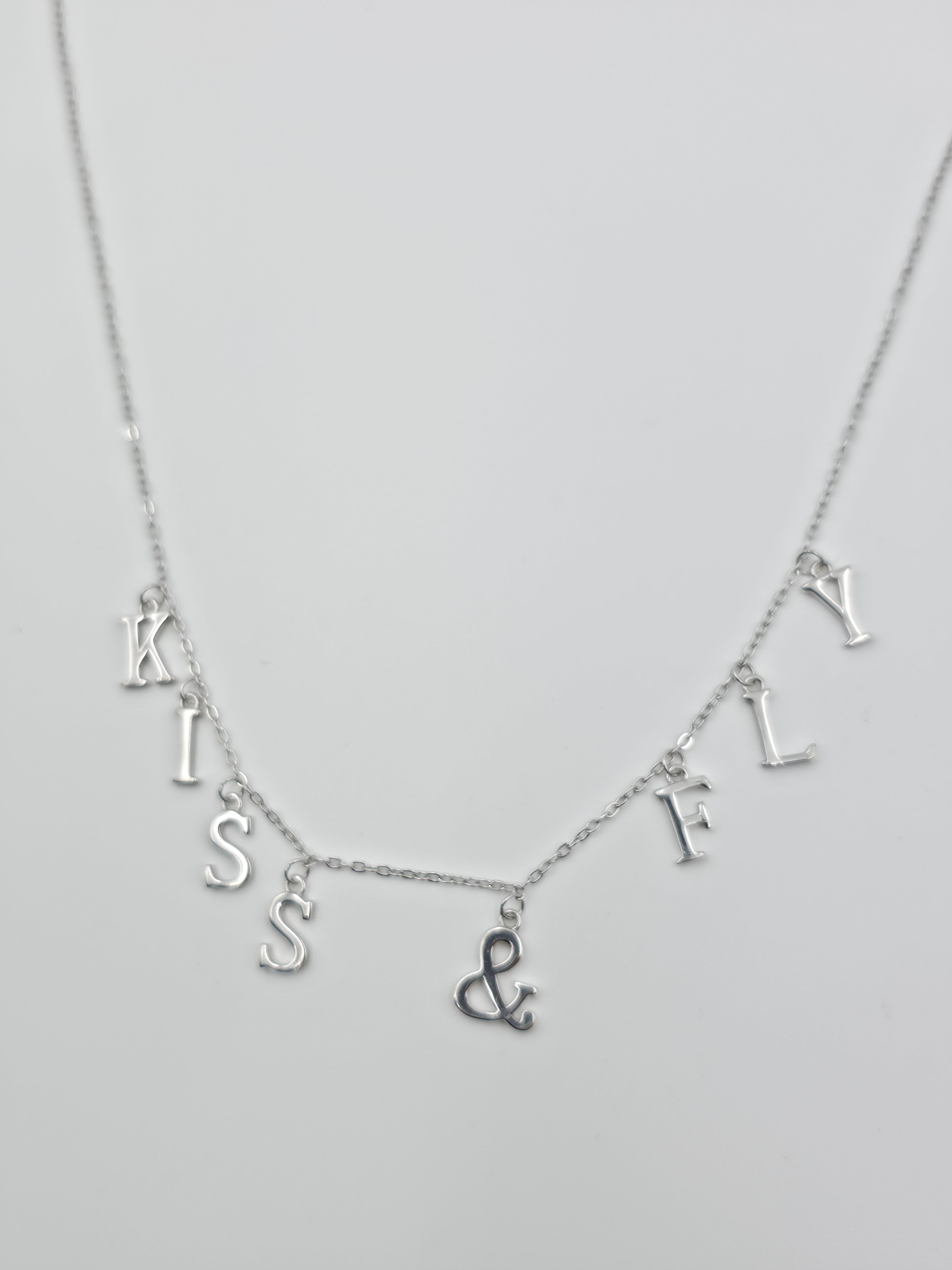Kiss & Fly Chain Pendant